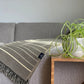 Equinoccio Throw Blanket - Cedar Brown